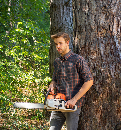 Woodcutter with chainsaw lumberjack with axe. Hipsters men on serious face with axe. Lumberjack brutal holds axe.