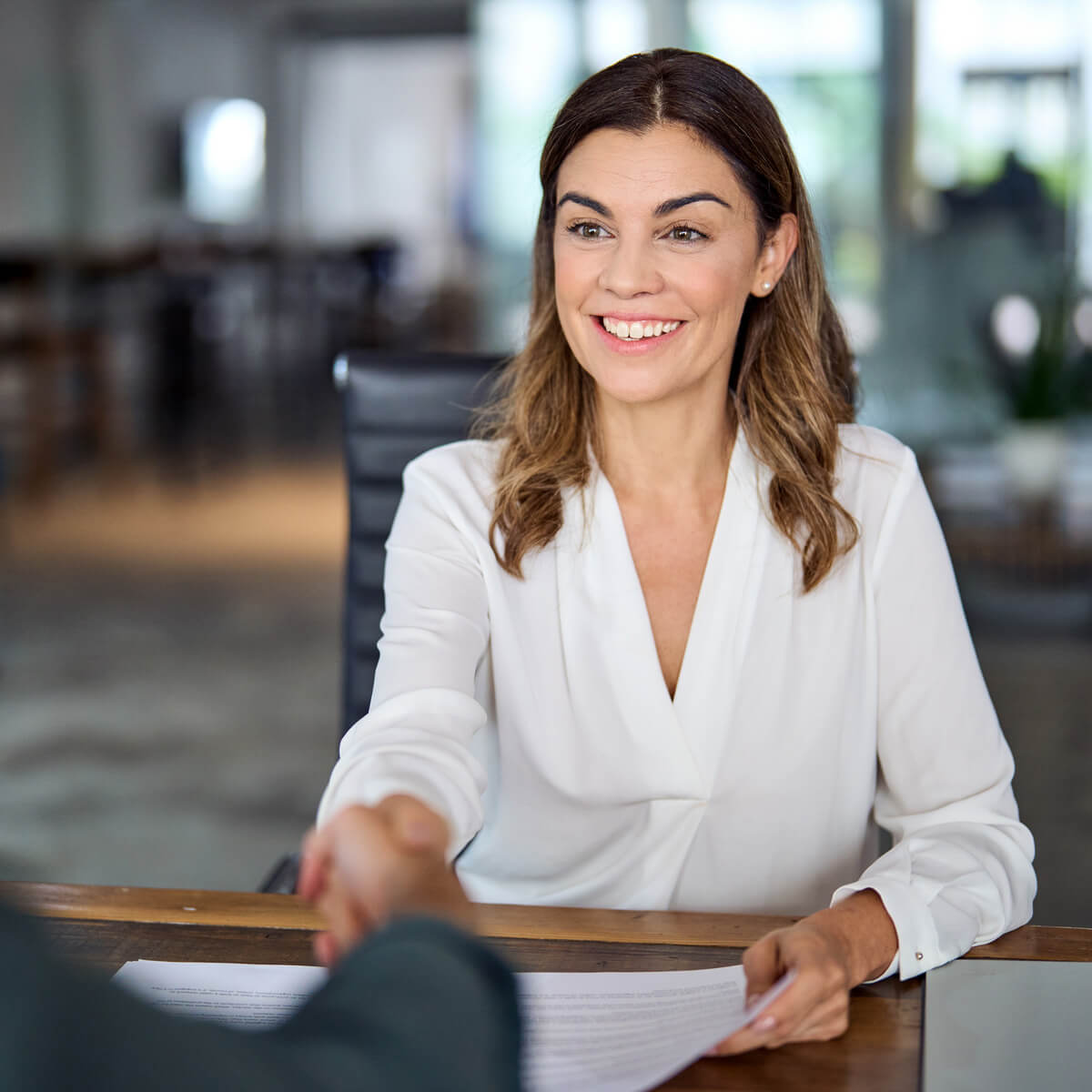 female-insurance-agent-shaking-hands